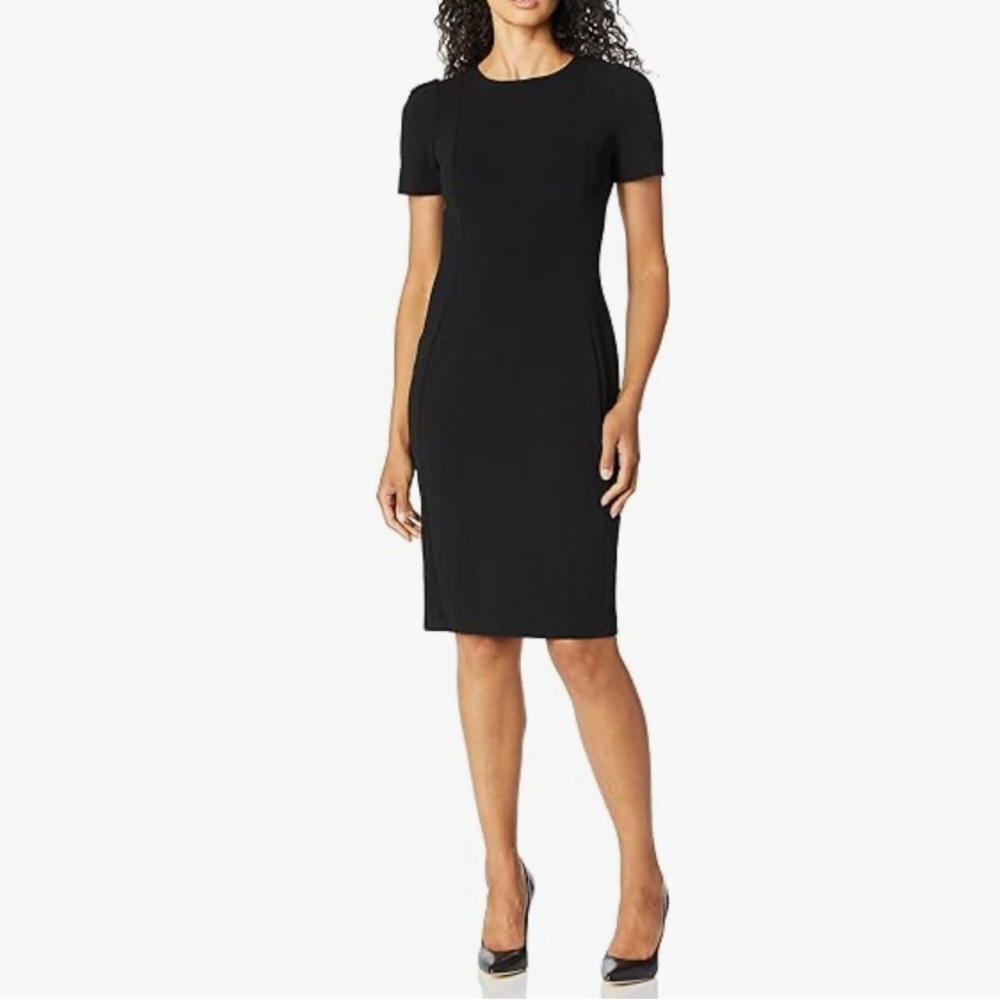 Calvin Klein mini dress with golden zip. Like new, worn just once